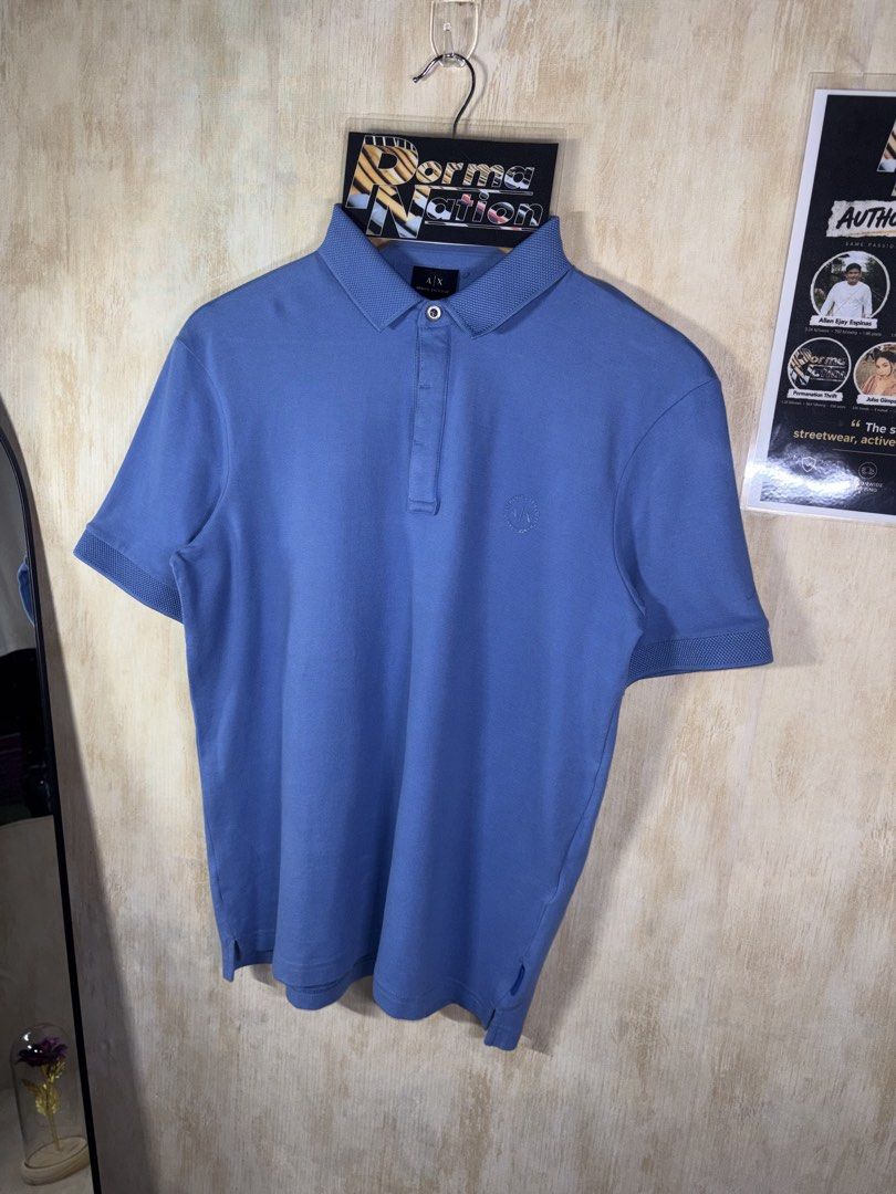 ARMANI EXCHANGE POLO SHIRT (Category: Tshirts & Polo Shirts ) located in Cabuyao City. Submitted by pormanation-thrift-store (Listing ID 1462301501, Image 3). Description: ARMANI EXCHANGE POLO SHIRT Condition: LIKE NEW Color rate: 10/10 (PWEDE SA MASELAN) Size: MEDIUM Issue: NONE‼️ Price: 1500.