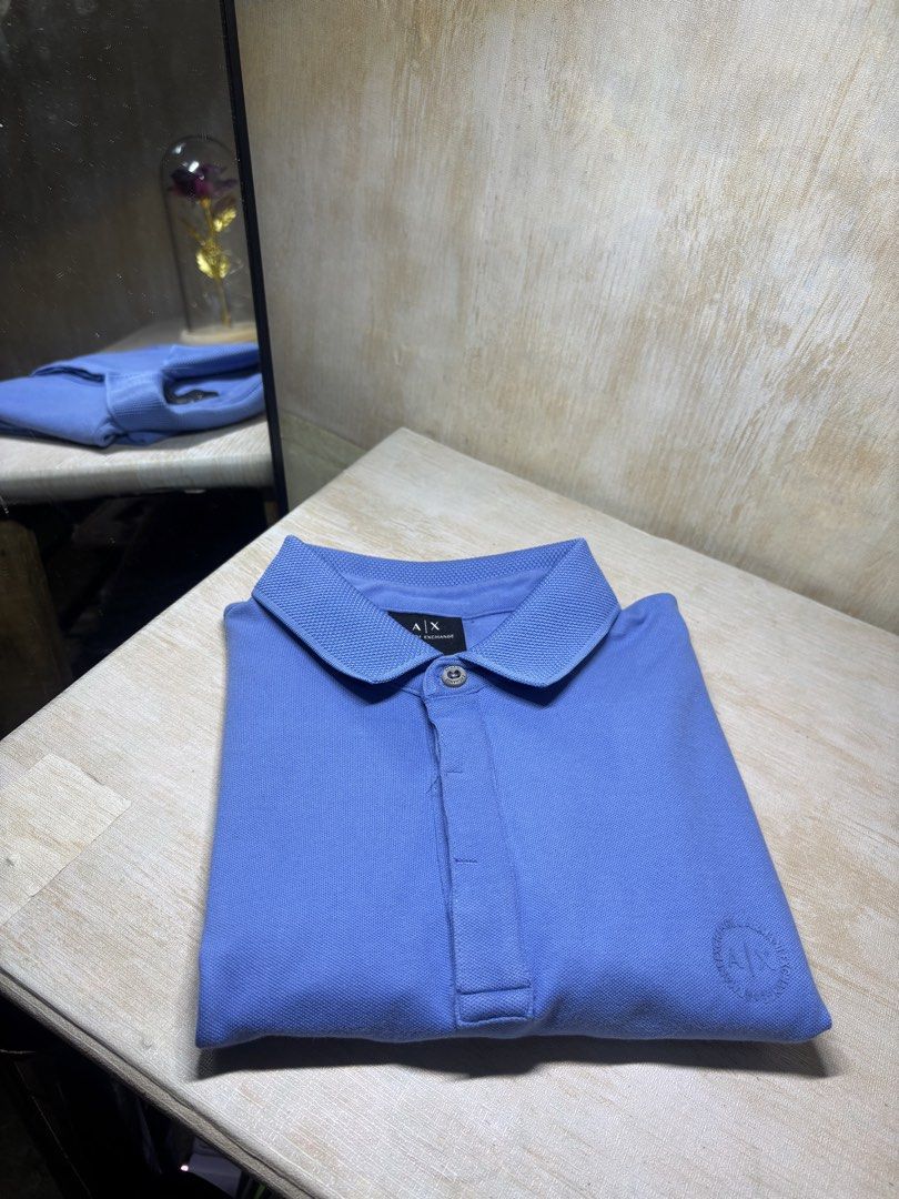 ARMANI EXCHANGE POLO SHIRT (Category: Tshirts & Polo Shirts ) located in Cabuyao City. Submitted by pormanation-thrift-store (Listing ID 1462301501, Image 2). Description: ARMANI EXCHANGE POLO SHIRT Condition: LIKE NEW Color rate: 10/10 (PWEDE SA MASELAN) Size: MEDIUM Issue: NONE‼️ Price: 1500.