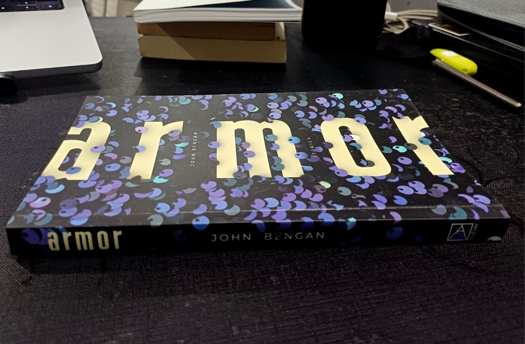 Armor by John Bengan - Short Stories (Category: Storybooks) located in Cavite. Submitted by sisturstidytreasures (Listing ID 1462418303, Image 1). Description: - "Short Stories Collection" by John Bengan - Published by Ateneo de Manila University Press (Bughaw imprint) - Features 13 tales of terror, longing, and defiance - Explores themes of survival, queer identity, and the Philippines - Ideal for fans of literary fiction - Bought from EVERYTHIN