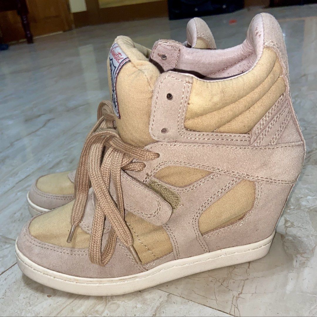 ASH Wedge Sneakers Size 37 (Category: Sneakers) located in Manila. Submitted by jenqumd030 (Listing ID 1462391278, Image 3). Description: - ASH wedge sneakers - Color: Beige and Pink - Style: Lace-up with velcro strap - Size: 37 - Condition: Pre-loved, with visible signs of wear (please check photos).