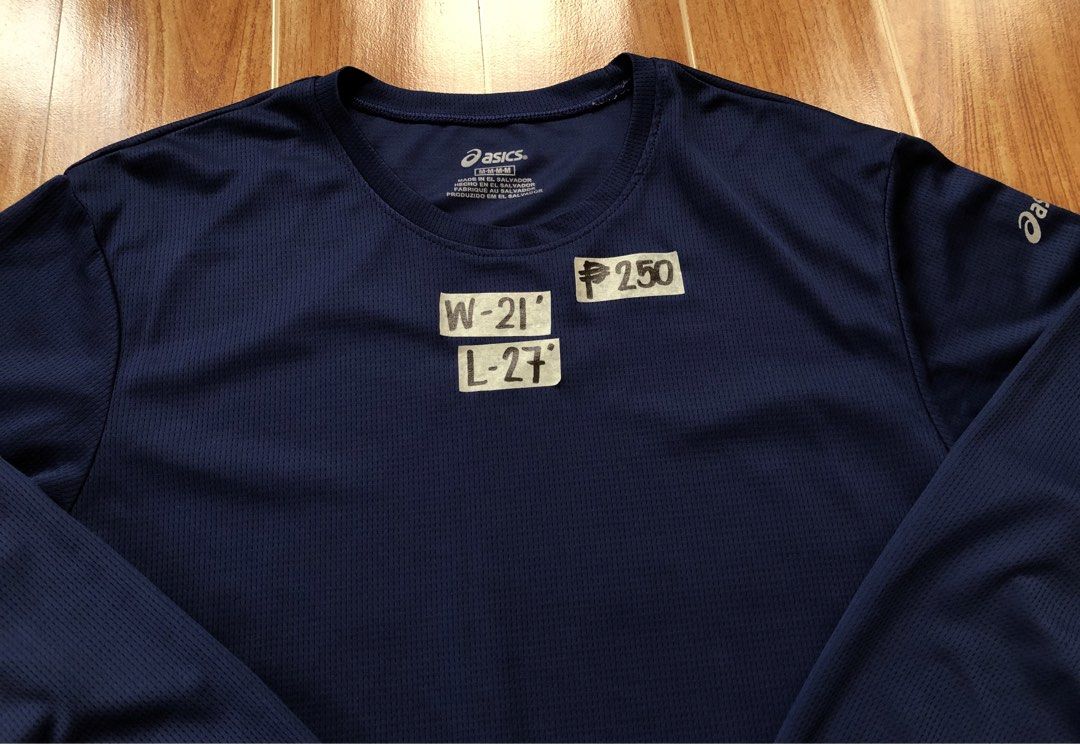 Asics Navy Blue Long Sleeve (Category: Tshirts & Polo Shirts ) located in Tarlac. Submitted by f8njcgvfqy90581 (Listing ID 1462358776, Image 2). Description: - Navy blue Asics long-sleeved shirt - Designed for athletic wear - Features Asics logo on the sleeve - Great for running and training.