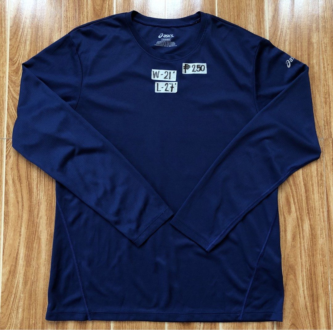 Asics Navy Blue Long Sleeve (Category: Tshirts & Polo Shirts ) located in Tarlac. Submitted by f8njcgvfqy90581 (Listing ID 1462358776, Image 1). Description: - Navy blue Asics long-sleeved shirt - Designed for athletic wear - Features Asics logo on the sleeve - Great for running and training.