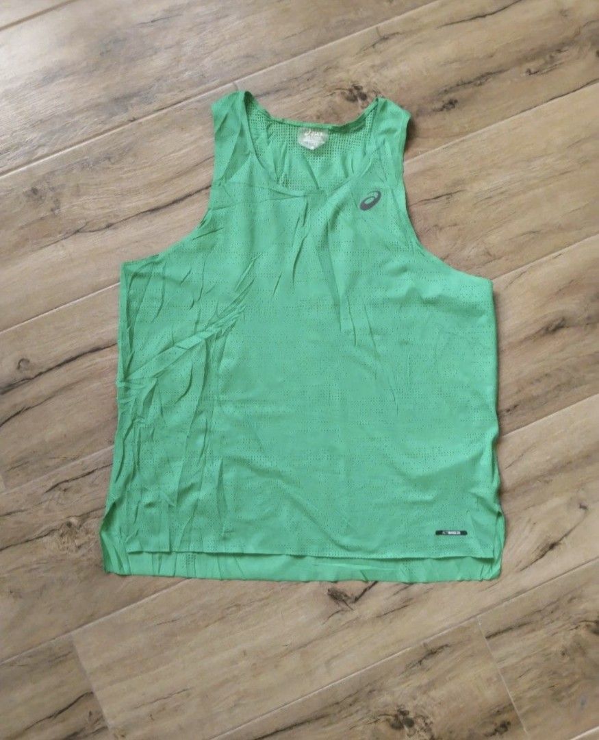 ASICS VENTILATE ACTIBREEZE SINGLET (Category: Activewear) located in Manila. Submitted by anthonyata85207 (Listing ID 1462267076, Image 1). Description: - Asics Ventilate Actibreeze Singlet - Size: L - Features ACTIBREEZE technology for superior breathability - All-over perforated design for enhanced ventilation - Ideal for running, workouts, and active wear - Made in Cambodia.