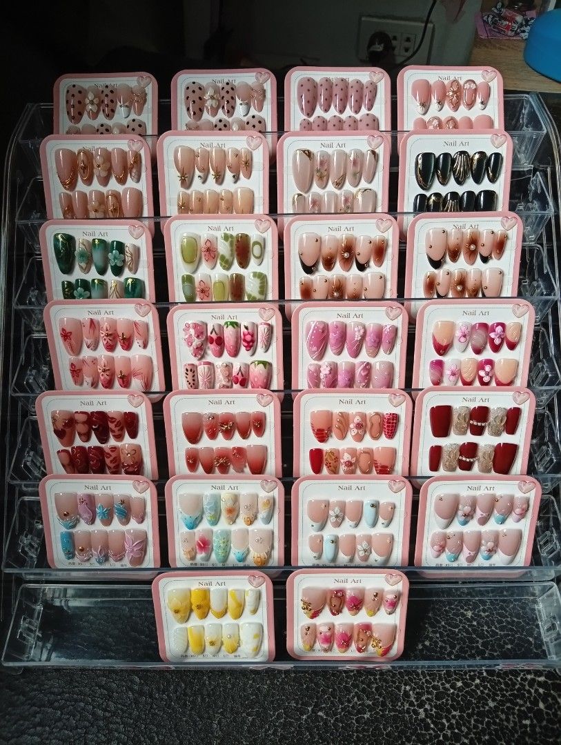 Assorted Designs Press-On Nails Set (Category: Hands & Nails) located in Manila. Submitted by shengsells (Listing ID 1462436675, Image 1). Description: Press On Nails! Sizes available: XS, S, M. With Nail Prep Kit. loc: BCD, 6100.