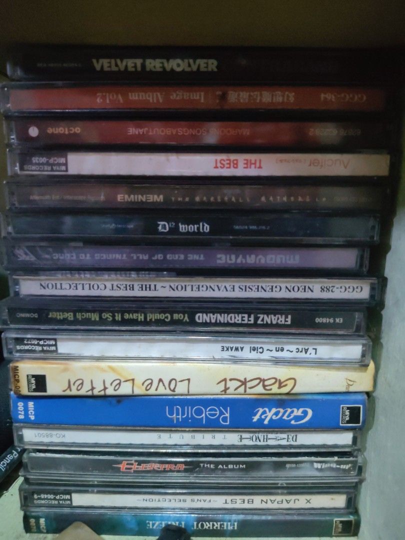 Assorted Music CDs - Various Artists and Genres (Category: Other Audio Equipment) located in Quezon City. Submitted by elmerbayaban304 (Listing ID 1462410415, Image 2). Description: - Music CD Collection featuring popular artists like Eminem, Linkin Park, and Queen. - Includes anime soundtracks and compilation albums. - Some CDs are Japanese releases. - All cases and discs are clearly shown in the provided photos. - Perfect for expanding your mus