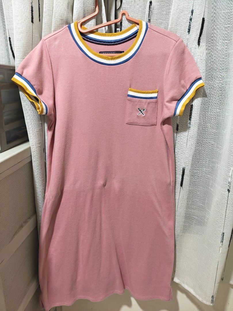 Assorted Polo Dresses and Graphic Top (Category: Dresses) located in General Santos City (Dadiangas). Submitted by cabilingga.juliemae (Listing ID 1462366152, Image 1). Description: - Bundle includes 4 polo dresses and 1 graphic top. - Brands featured: Giordano, Regatta. - Colors: Pink, Teal Stripes, Green, Purple, Green Graphic Top. - All items are short-sleeved. - Suitable for casual everyday wear..