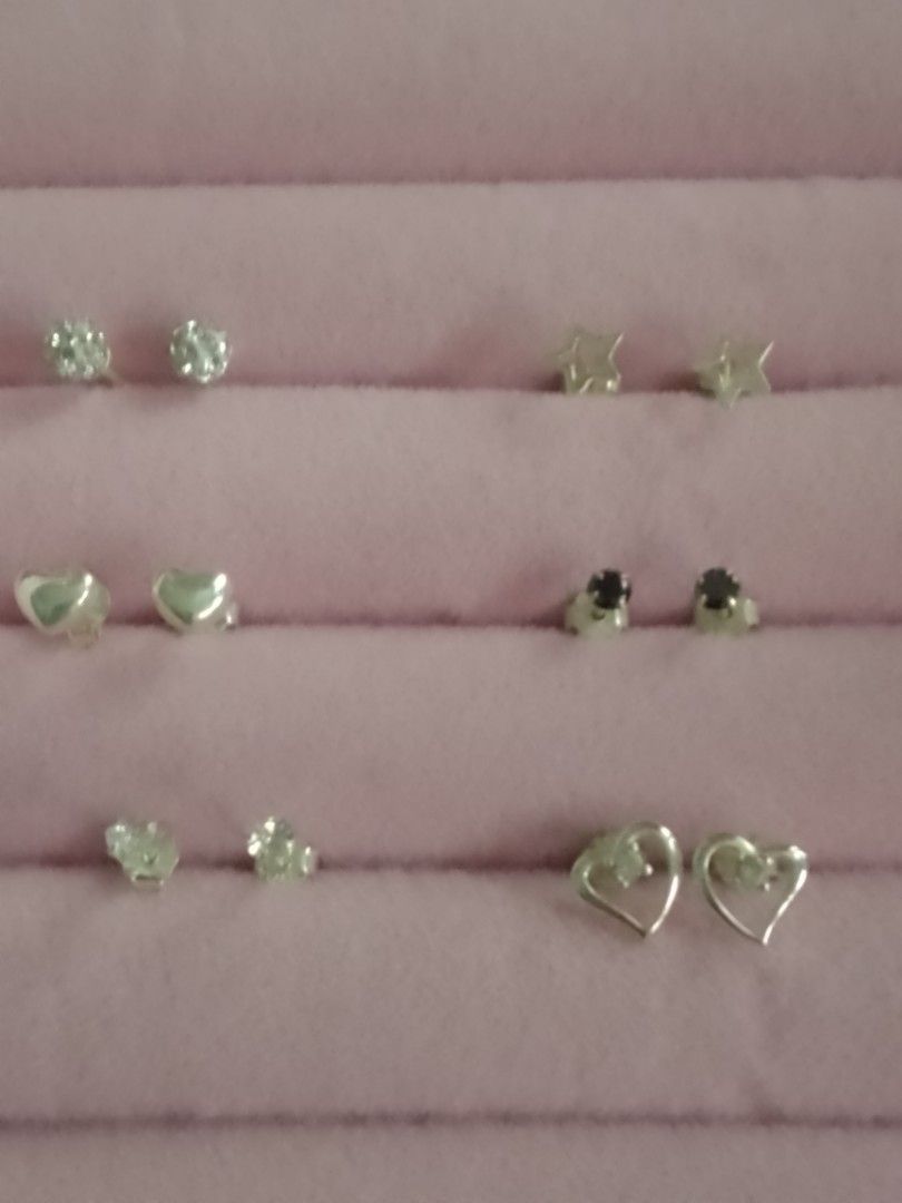 Assorted Stud Earrings - Silver 925 (Category: Earrings) located in Malabon City. Submitted by freecrystal.fa0732 (Listing ID 1462332756, Image 2). Description: Ounis silver stud earrings, two on top bnew, the rest like new/lightly used takeall for 600. can do meet ups near me shipping fee shouldered by buyer.