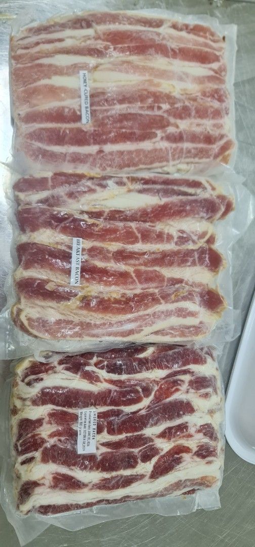 Assorted Vacuum-Sealed Bacon: Honey-Cured, Breakfast, Smoked, Cuts (Category: Chilled & Frozen Food) located in Quezon City. Submitted by marulim12 (Listing ID 1462285700, Image 1). Description: - Assorted vacuum-sealed bacon varieties available: Honey-Cured, Breakfast, Smoked, and Bacon Cuts . - thick cut bacons 100% meat quality! - all packing 500grams per pack - Perfect for cooking, ideal for breakfast or any meal. - Fresh from smoked house an