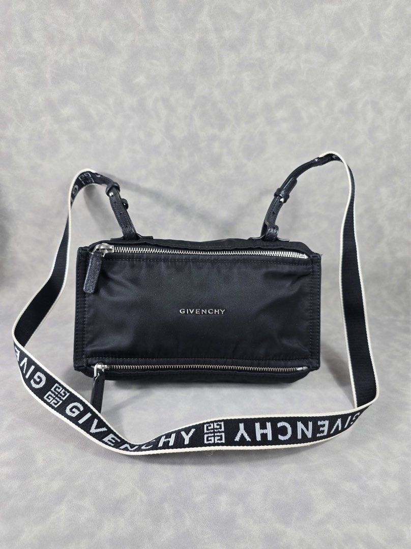 Authentic Givenchy Pandora Mini (Category: Luxury Bags & Wallets) located in Taguig. Submitted by luxchelry (Listing ID 1462368080, Image 1). Description: Mini Pandora ♦️Comes with detachable strap ♦️9.5/10 ♦️Any discoloration is due to lighting only. ✨️P22000✨️ 📍Taguig All items are 100% authentic. Money back guarantee if the item is proven fake. Disclaimer: All product names, logos, brands and other trademarks or images shown mentioned are the