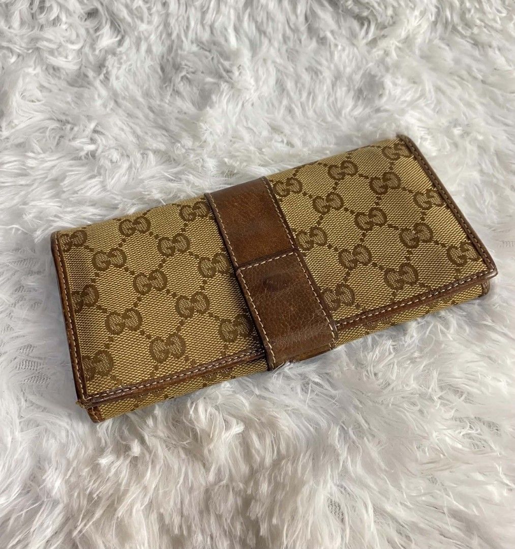 AUTHENTIC GUCCI CONTINENTAL FLAP LONG WALLET (Category: Luxury Bags & Wallets) located in Bayombong. Submitted by Gentlemans_ClosEt (Listing ID 1462386497, Image 2). Description: AUTHENTIC GUCCI CONTINENTAL FLAP LONG WALLET 💯 % GUARANTEED AUTHENTIC GOOD CONDITION ISSUE? PLEASE VIEW LAST TWO PIC.