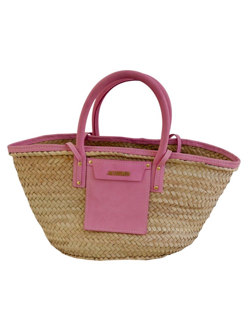 Authentic Jacquemus Le Panier Soleil Straw Bag Pink (Category: Luxury Bags & Wallets) located in Manila. Submitted by serendipitymanila (Listing ID 1456567972, Image 3). Description: - Authentic Jacquemus straw bag - Natural straw material - Chic pink leather trim and handles - Signature Jacquemus logo patch in pink leather - Ideal size for summer essentials - Versatile for beach days or daily wear.