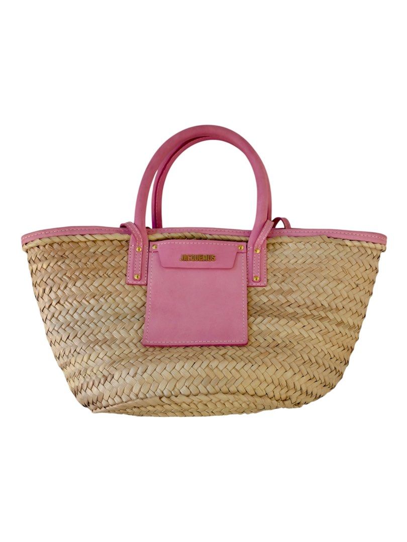 Authentic Jacquemus Le Panier Soleil Straw Bag Pink (Category: Luxury Bags & Wallets) located in Manila. Submitted by serendipitymanila (Listing ID 1456567972, Image 2). Description: - Authentic Jacquemus straw bag - Natural straw material - Chic pink leather trim and handles - Signature Jacquemus logo patch in pink leather - Ideal size for summer essentials - Versatile for beach days or daily wear.