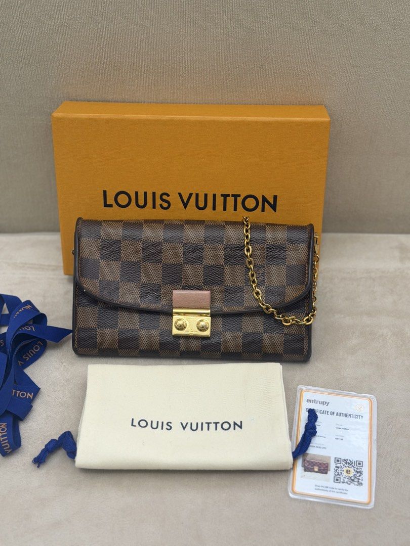 Authentic Louis Vuitton Damier Ebene Croisette Wallet on Chain (Category: Luxury Bags & Wallets) located in Manila. Submitted by maria_2326 (Listing ID 1454029491, Image 3). Description: Louis Vuitton Croisette Wallet on Chain Damier Ebene Guarantee Authentic Inclusions: Box w/ ribbon Dust Bag Entrupy Chain Flaw: Minimal sour smell Normal signs of used (see detailed photos) Location: Manila/QC.