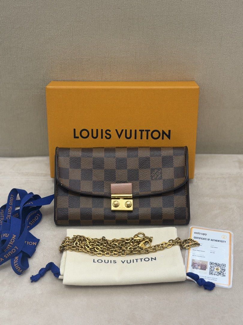 Authentic Louis Vuitton Damier Ebene Croisette Wallet on Chain (Category: Luxury Bags & Wallets) located in Manila. Submitted by maria_2326 (Listing ID 1454029491, Image 1). Description: Louis Vuitton Croisette Wallet on Chain Damier Ebene Guarantee Authentic Inclusions: Box w/ ribbon Dust Bag Entrupy Chain Flaw: Minimal sour smell Normal signs of used (see detailed photos) Location: Manila/QC.
