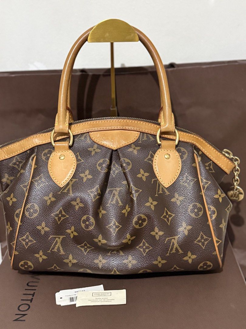 Authentic LV Tivoli PM (Category: Purses & Pouches) located in Manila. Submitted by reg08 (Listing ID 1462342811, Image 2). Description: With box and dustbag.
