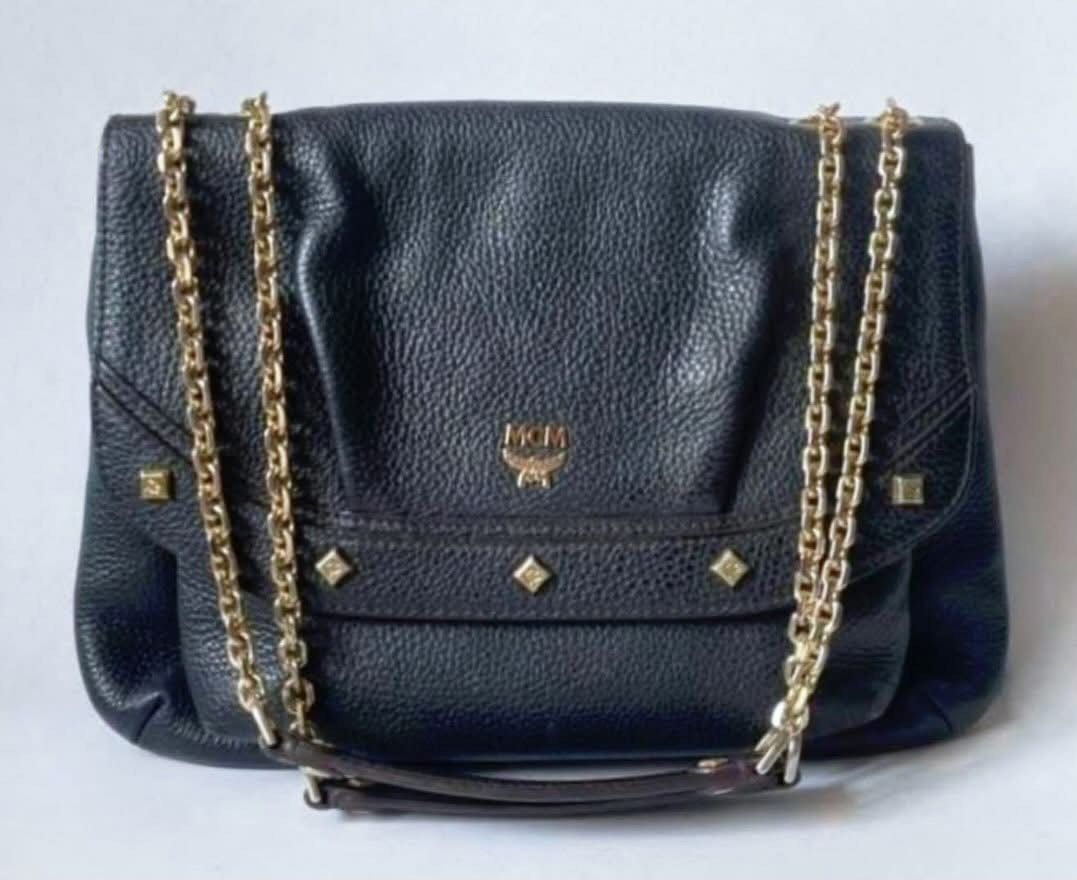 Authentic MCM (Category: Luxury Bags & Wallets) located in Manila. Submitted by chloe_luxuries (Listing ID 1462321959, Image 1). Description: Guaranteed Original MCM milla Studded Chain Shoulder bag Still in very good condition No more inclusion bag only Pm for more details.