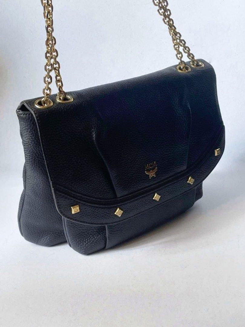 Authentic MCM (Category: Luxury Bags & Wallets) located in Manila. Submitted by chloe_luxuries (Listing ID 1462321959, Image 2). Description: Guaranteed Original MCM milla Studded Chain Shoulder bag Still in very good condition No more inclusion bag only Pm for more details.