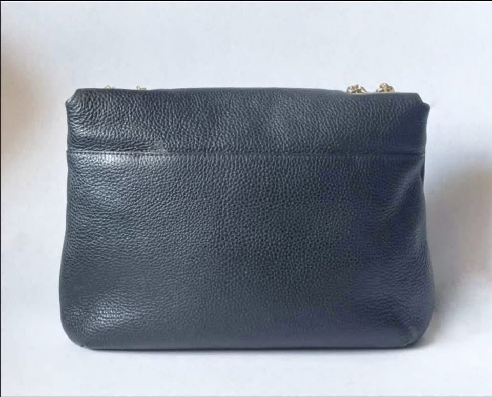 Authentic MCM (Category: Luxury Bags & Wallets) located in Manila. Submitted by chloe_luxuries (Listing ID 1462321959, Image 3). Description: Guaranteed Original MCM milla Studded Chain Shoulder bag Still in very good condition No more inclusion bag only Pm for more details.