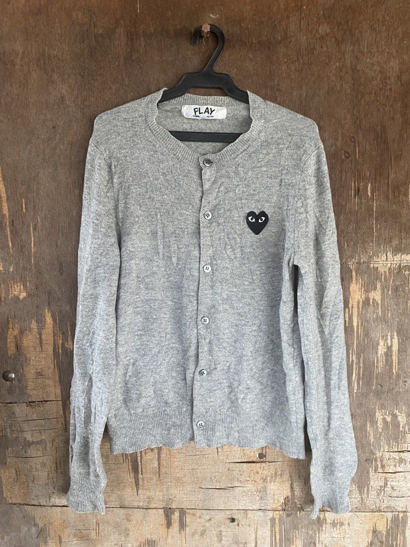 Authentic PLAY CDG (Category: Others Tops) located in Padada. Submitted by mericbanabana (Listing ID 1462266769, Image 1). Description: Authentic/legit cdg play moneybwck guaranted if proven fake. 5 digits yan sa retail 100% wool Buttons made in mother of pearl.