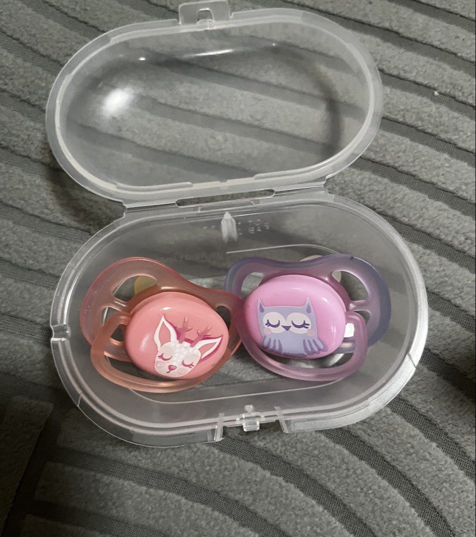 Avent Pacifier Set with Case (Category: Soothers & Pacifiers) located in General Santos City (Dadiangas). Submitted by my_lzlove (Listing ID 1462397296, Image 1). Description: Pink-used Purple- unused.