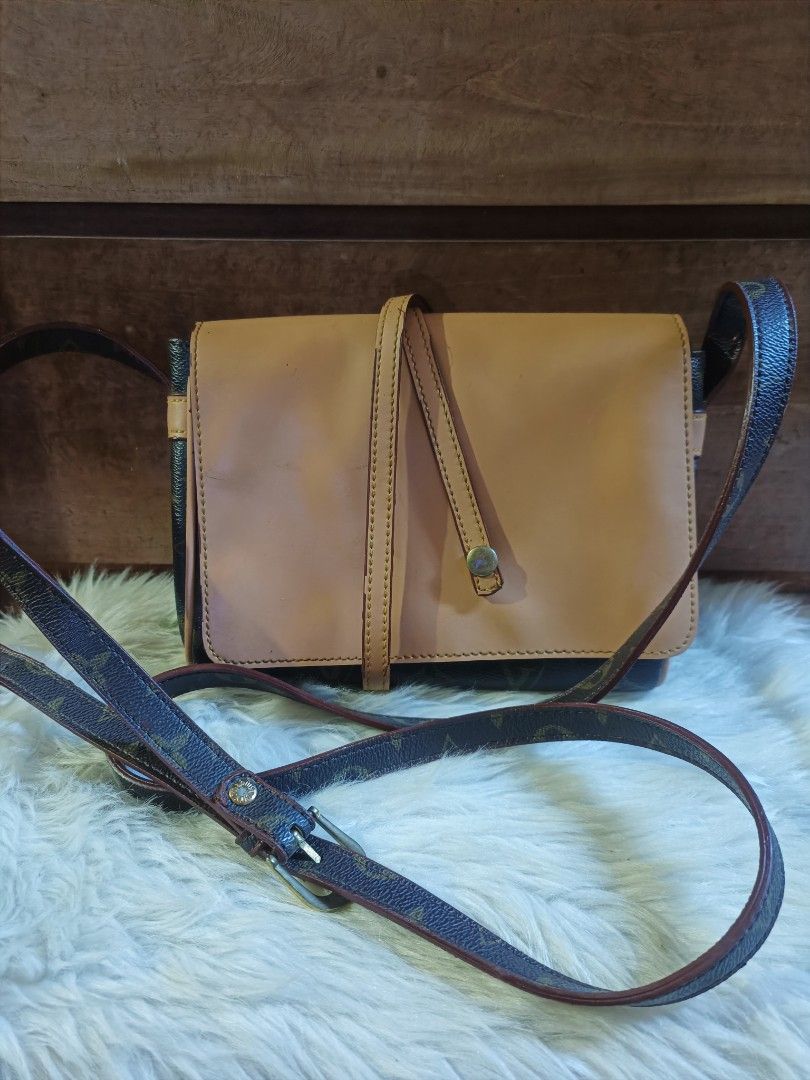 B1T1 Louis Vuitton Monogram Chain Shoulder Bag (Category: Luxury Bags & Wallets) located in Cebu City. Submitted by elen30abalo (Listing ID 1460623768, Image 3). Description: - Classic Louis Vuitton shoulder bag - Monogram canvas flap - Black leather body - Gold chain detail along the bottom - Black interior - Clasp closure - Adjustable strap.