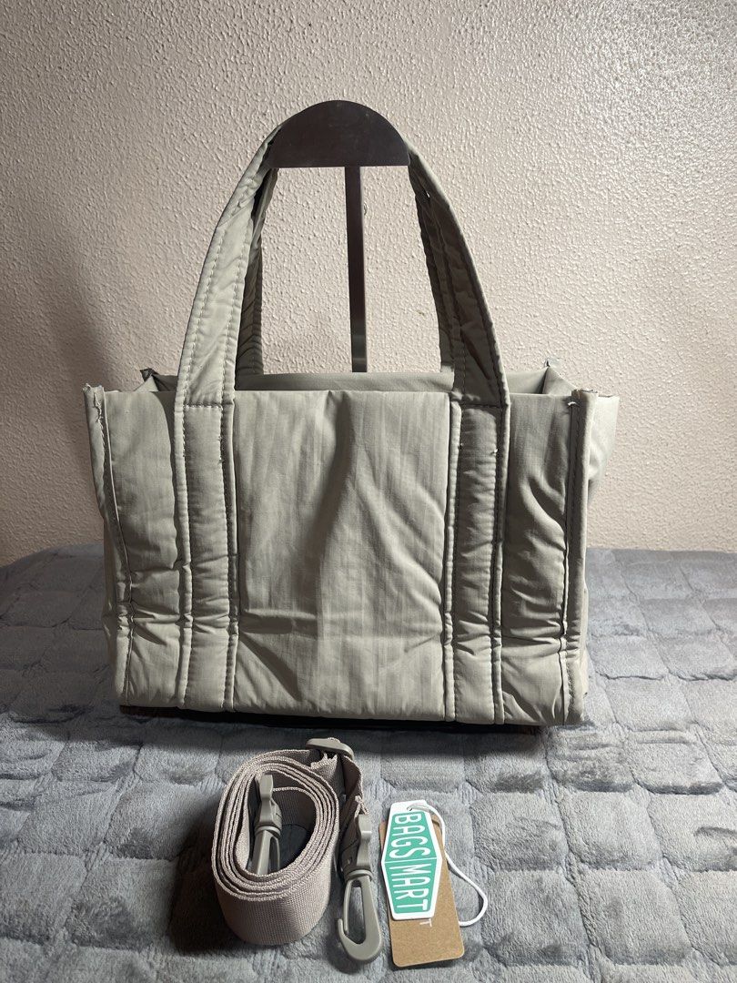 BAGSMART Puffer Tote Bag with Strap - Light Grey (Category: Tote Bags) located in Quezon City. Submitted by donnabelle7572 (Listing ID 1462383575, Image 2). Description: - BAGSMART light camel puffer mini tote bag - Adjustable shoulder strap - Brand new with tag still attached -Lenght-28cm -Width-12cm -Height-20cm.