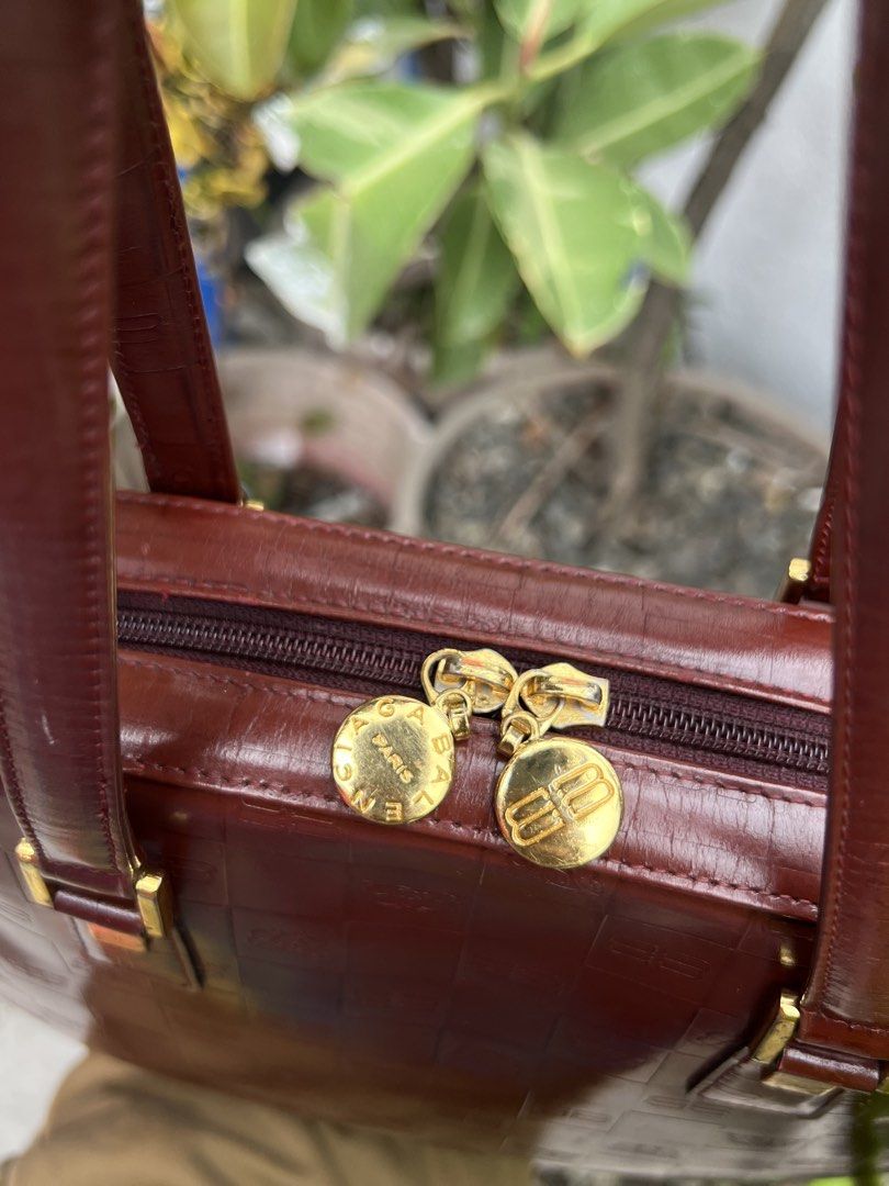 Balenciaga (Category: Luxury Bags & Wallets) located in Bacolod City. Submitted by novymae23 (Listing ID 1462280491, Image 3). Description: Balenciaga monogram-embossed leather handbag burgundy .