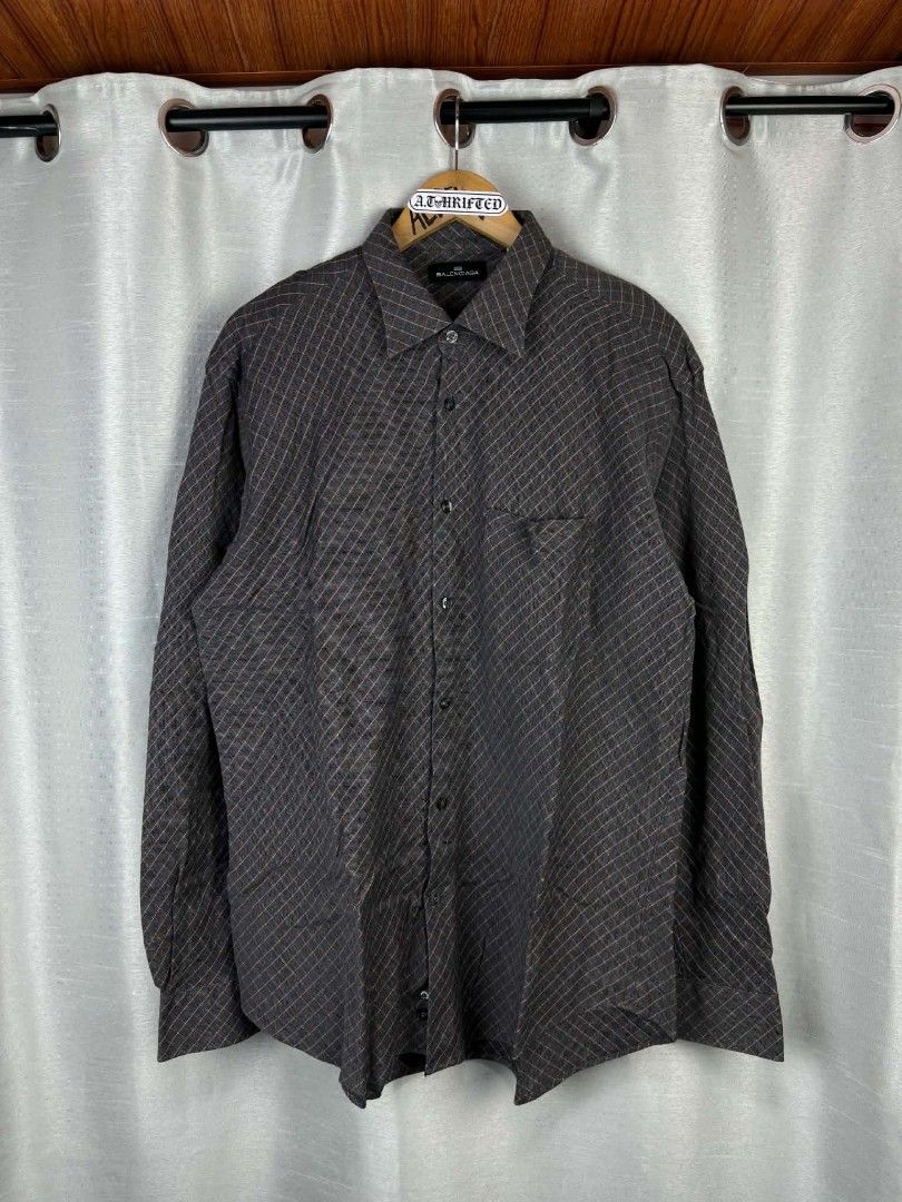 Balenciaga Button-Up Shirt - Grey Plaid Pattern (Category: Tshirts & Polo Shirts ) located in Tanza. Submitted by aldrintamayo (Listing ID 1462305232, Image 1). Description: - Balenciaga button-up shirt - Color: Grey with orange plaid pattern - Style: Classic collar, button-down front - Features: Single chest pocket - Size: Tag shows 6 (185/96A) - Ideal for: Smart casual outfits.