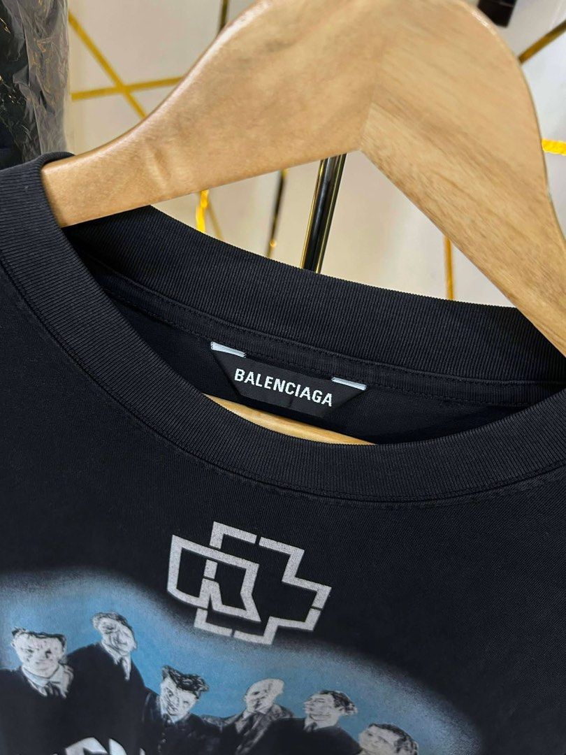 Balenciaga Rammstein Graphic Tee (Category: Luxury Apparel) located in Manila. Submitted by cachegoodsuncovers (Listing ID 1462332862, Image 2). Description: 🚨Balenciaga Rammstein Graphic Tee🚨 ✅️SIZE: S on tag ✅Oversized fittings ✅️DIMES - L-31 W-22 ✅️CONDITION - Exellent ✅️COLOR RATE - 9.9/10 ✅️Heavy cloth ✅️Distressed/sleeve&hem ✅️Embroidered logo at back ✅️ISSUE - ❌️ .