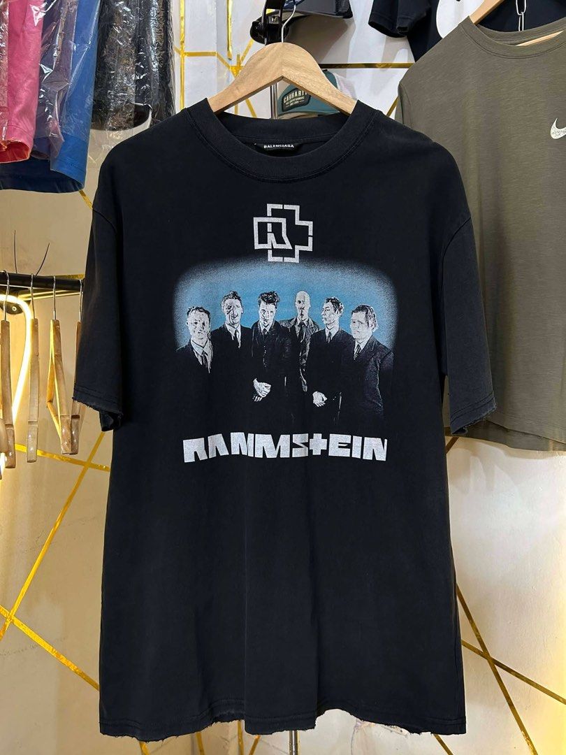 Balenciaga Rammstein Graphic Tee (Category: Luxury Apparel) located in Manila. Submitted by cachegoodsuncovers (Listing ID 1462332862, Image 1). Description: 🚨Balenciaga Rammstein Graphic Tee🚨 ✅️SIZE: S on tag ✅Oversized fittings ✅️DIMES - L-31 W-22 ✅️CONDITION - Exellent ✅️COLOR RATE - 9.9/10 ✅️Heavy cloth ✅️Distressed/sleeve&hem ✅️Embroidered logo at back ✅️ISSUE - ❌️ .