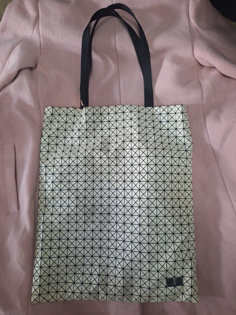 Bao Bao Issey Miyake Tote Bag (Category: Tote Bags) located in Puerto Princesa. Submitted by jercksthriftph (Listing ID 1462267488, Image 1). Description: Bao Bao Issey Miyake tote bag very good condition, need cleaning item is thrifted/ukay issue on inside sa brand tag check last pic for details.