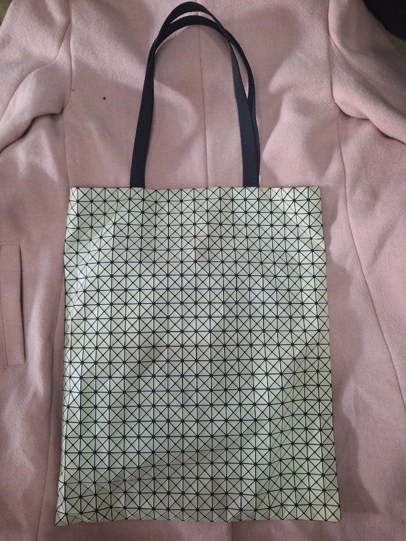 Bao Bao Issey Miyake Tote Bag (Category: Tote Bags) located in Puerto Princesa. Submitted by jercksthriftph (Listing ID 1462267488, Image 2). Description: Bao Bao Issey Miyake tote bag very good condition, need cleaning item is thrifted/ukay issue on inside sa brand tag check last pic for details.