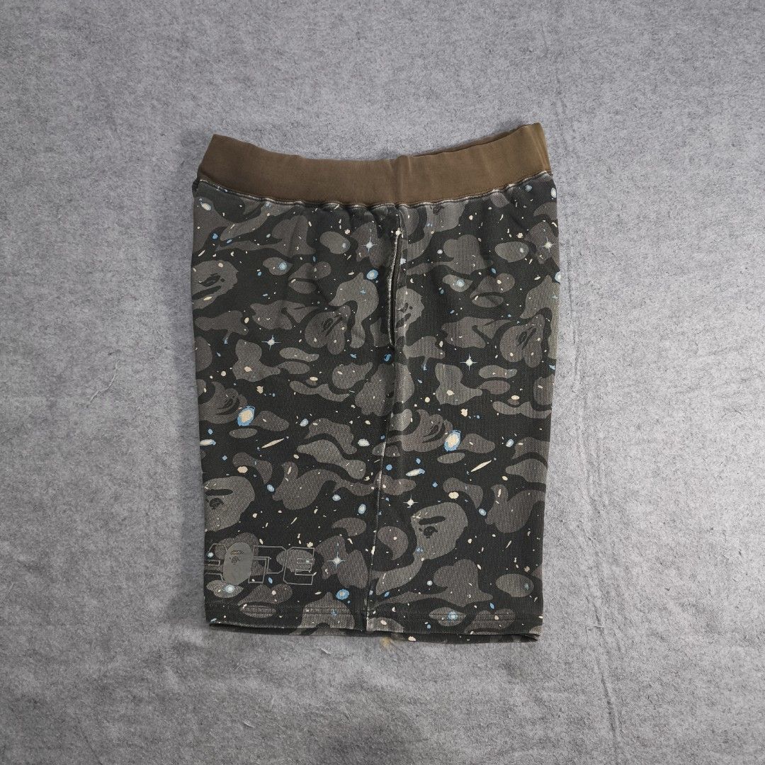 Bape Space Camouflage Sweat Shorts (Category: Activewear) located in Manila. Submitted by shykes_26 (Listing ID 1462343356, Image 1). Description: Dimensions: Waist - 36-40 Length - 22 Leg open - 15.5 Issues: Sign of use.