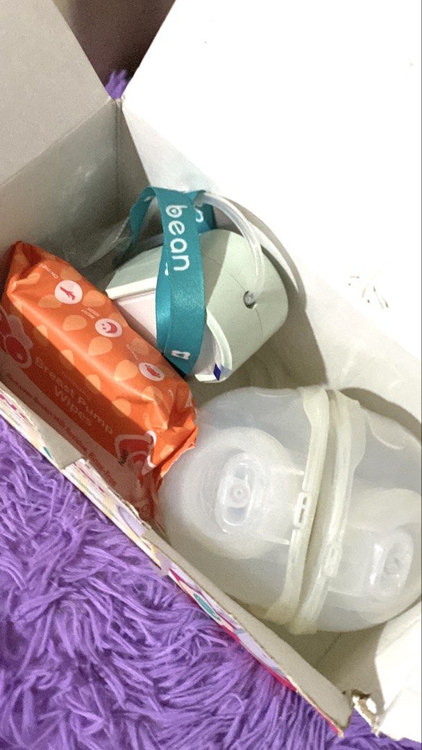 Bean FlowWonder Double Electric Wearable Breast Pump (Category: Breastfeeding & Bottle Feeding) located in Quezon City. Submitted by macastillo1998 (Listing ID 1462348053, Image 3). Description: - FlowWonder double electric wearable breast pump - Perfect for busy moms - Allows pumping anytime, anywhere - Easy to use and clean - All parts shown in photos included - Comes with original box and accessories.