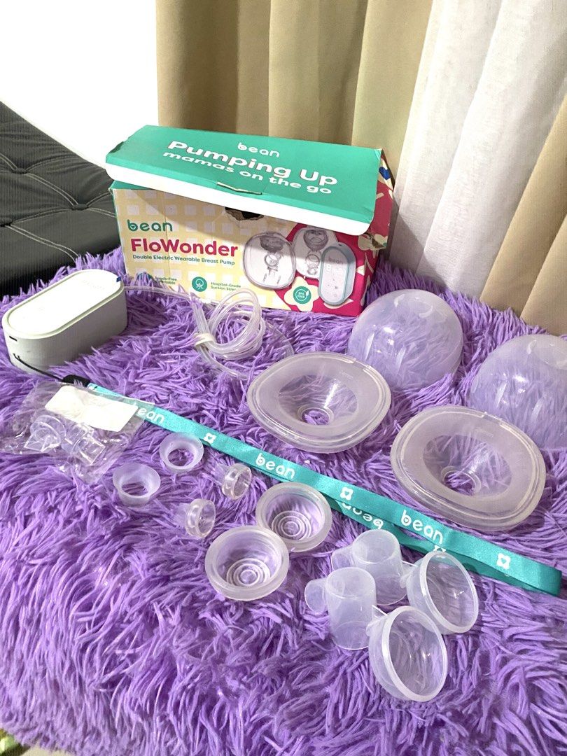Bean FlowWonder Double Electric Wearable Breast Pump (Category: Breastfeeding & Bottle Feeding) located in Quezon City. Submitted by macastillo1998 (Listing ID 1462348053, Image 1). Description: - FlowWonder double electric wearable breast pump - Perfect for busy moms - Allows pumping anytime, anywhere - Easy to use and clean - All parts shown in photos included - Comes with original box and accessories.