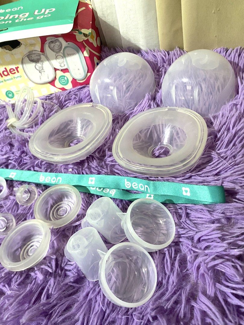 Bean FlowWonder Double Electric Wearable Breast Pump (Category: Breastfeeding & Bottle Feeding) located in Quezon City. Submitted by macastillo1998 (Listing ID 1462348053, Image 2). Description: - FlowWonder double electric wearable breast pump - Perfect for busy moms - Allows pumping anytime, anywhere - Easy to use and clean - All parts shown in photos included - Comes with original box and accessories.