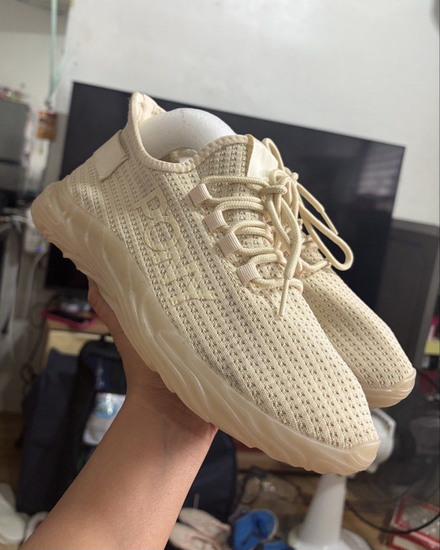 Beige Knit Sneakers (Category: Sneakers) located in Caloocan City. Submitted by juana_finds26 (Listing ID 1462408791, Image 1). Description: - Lightweight beige knit sneakers - Easy slip-on design - Unique wavy sole for style and grip - Ideal for casual wear and light workouts - Breathable and comfortable material.