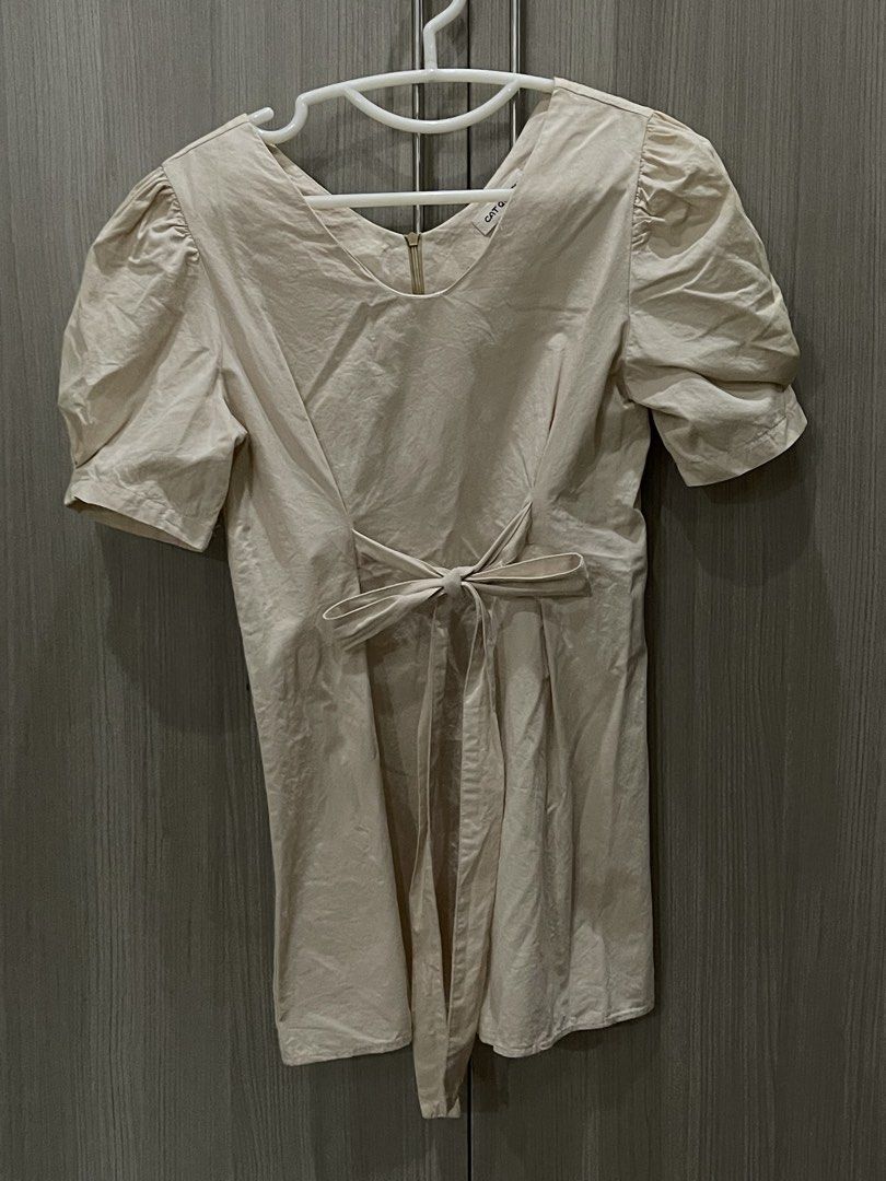 Beige Puff Sleeves Minidress (Category: Dresses) located in Manila. Submitted by shiezzels (Listing ID 1462409664, Image 1). Description: Cat Queen Beige Puff Sleeved Mini Dress Has a tie detail that can be tied in front or at the back. Best fit small to medium..