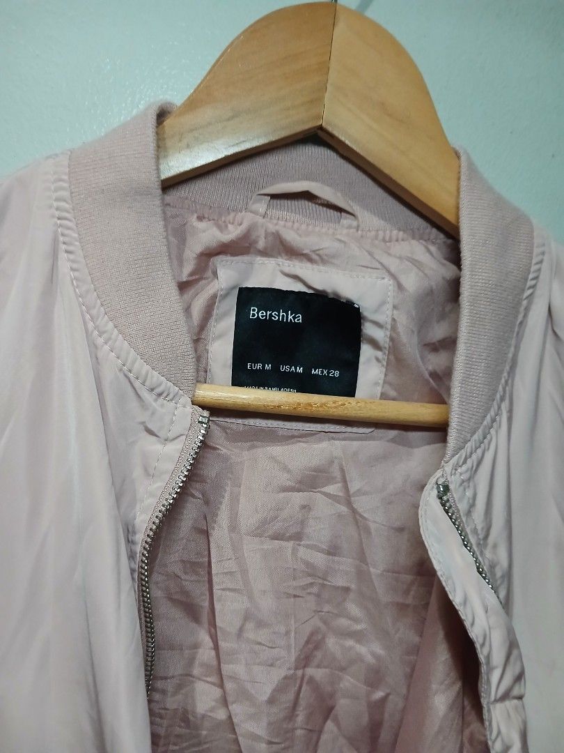 Bershka Pink Bomber Jacket (Category: Coats, Jackets and Outerwear) located in Pasig City. Submitted by carmelaelizalde (Listing ID 1462421888, Image 3). Description: - Size: Medium (M) - Functional front pockets - Zip pocket on the sleeve - Ribbed cuffs and hem.