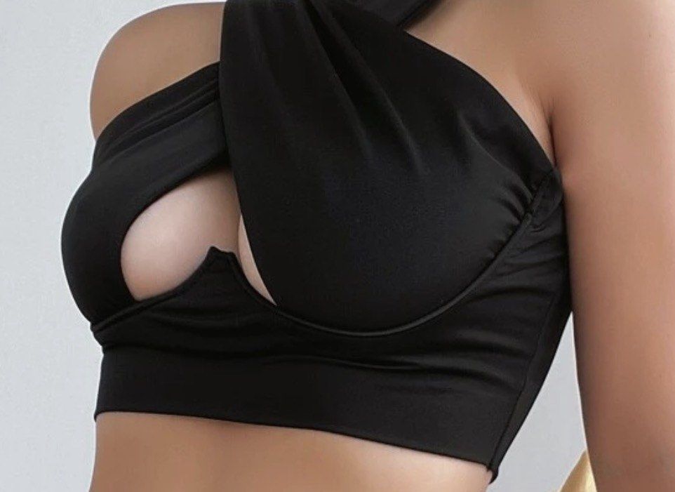 Black Halter Neck Cut-Out Crop Top (Category: Sleeveless) located in Paranaque City. Submitted by nikadeclutters (Listing ID 1462343248, Image 2). Description: Chic black halter neck crop top with a front cut-out. Stretchy fabric. Versatile for night outs or casual wear..