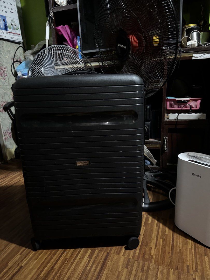 Racini Brand Luggage (Category: Luggage) located in Malabon City. Submitted by shielalyn012 (Listing ID 1462268581, Image 3). Description: - can fit up to 35 kilos -Sturdy black hardcase luggage - Smooth-rolling wheels for easy transport - Stylish ribbed exterior design - Ideal for all your travel needs.