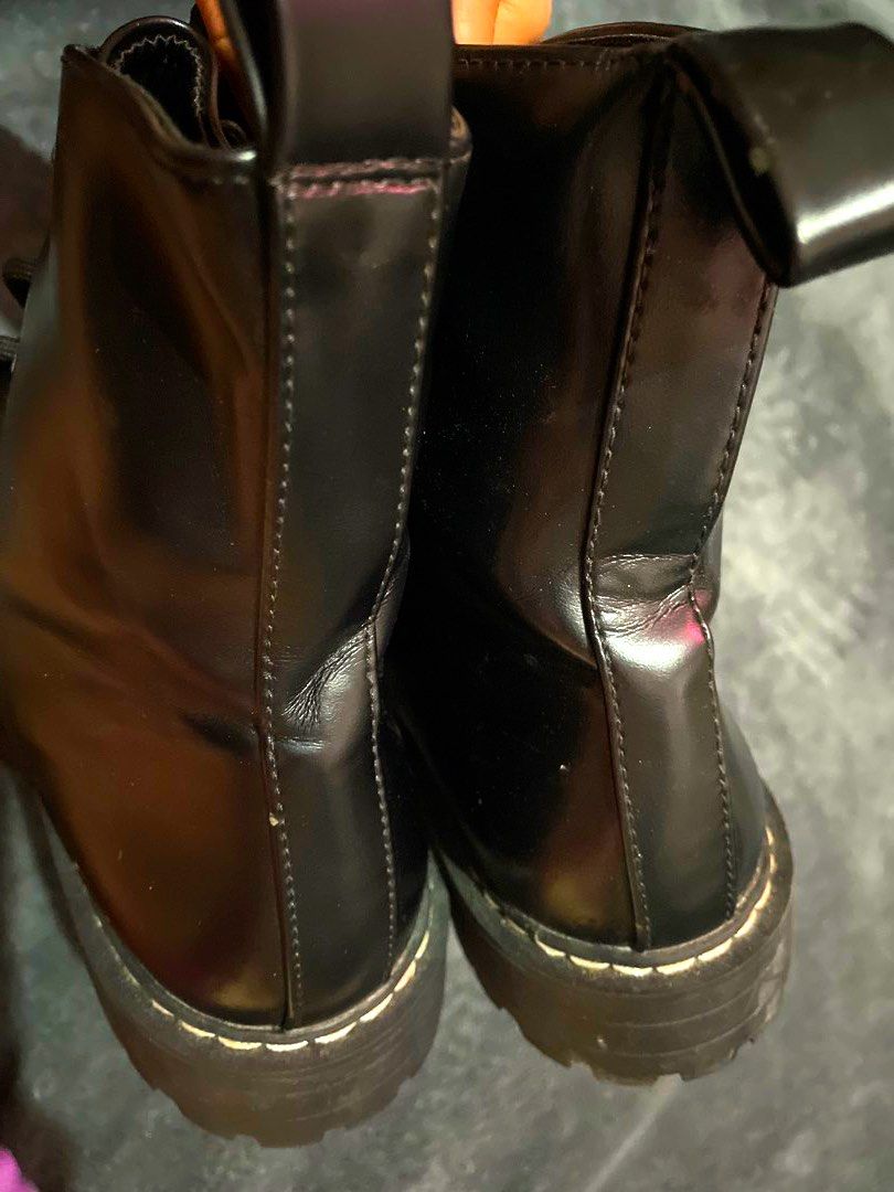 Black Lace-Up Chunky Platform Boots (Category: Boots) located in Manila. Submitted by myshanshine (Listing ID 1460853249, Image 3). Description: - Black faux leather ankle boots - Lace-up front for a secure fit - Chunky platform sole for added height and style - Excellent grip on the sole - Versatile: pairs well with jeans and dresses - Ideal for everyday wear.