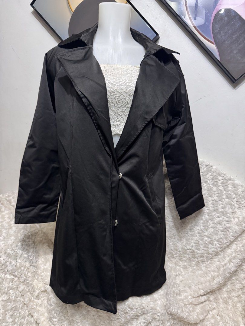 Black Long Trench Coat with Collar (Category: Coats, Jackets and Outerwear) located in Marikina City. Submitted by lorradel (Listing ID 1462327258, Image 1). Description: - fits L- semi XL - lakas makasyala - Classic black trench coat - Features a collar and button closure - Long sleeves - Ideal for layering over outfits - Perfect for cooler weather - Versatile addition to any wardrobe - MAY HAVE some washable stains (hindi maiiwasan) needs washi