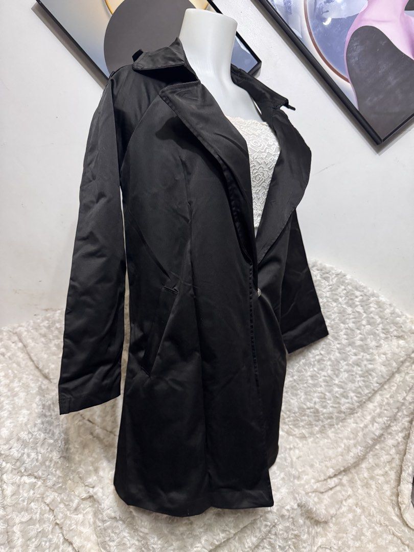 Black Long Trench Coat with Collar (Category: Coats, Jackets and Outerwear) located in Marikina City. Submitted by lorradel (Listing ID 1462327258, Image 2). Description: - fits L- semi XL - lakas makasyala - Classic black trench coat - Features a collar and button closure - Long sleeves - Ideal for layering over outfits - Perfect for cooler weather - Versatile addition to any wardrobe - MAY HAVE some washable stains (hindi maiiwasan) needs washi