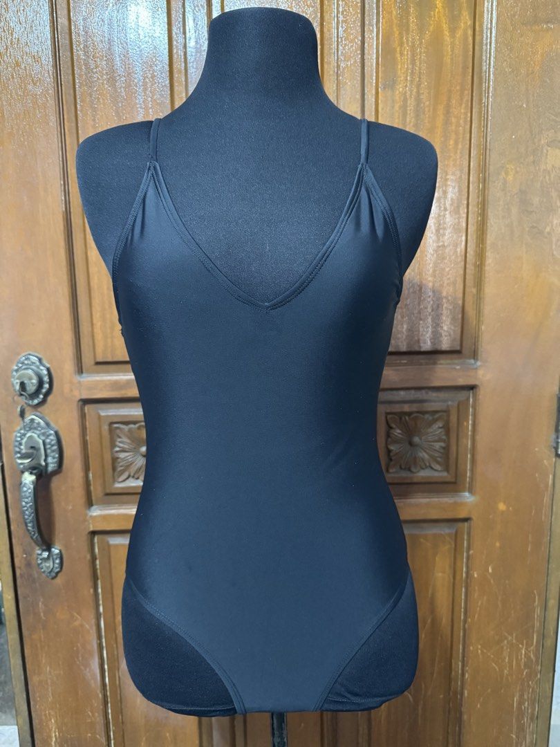 Black One-Piece Swimsuit V-Neck Spaghetti Straps (Category: Bikinis & Swimsuits) located in Manila. Submitted by prelovedshopmnl (Listing ID 1462282944, Image 1). Description: - Classic black one-piece swimsuit - Flattering V-neckline - Delicate spaghetti straps - Low scoop back design - Smooth and stretchy material - Perfect for swimming or lounging.