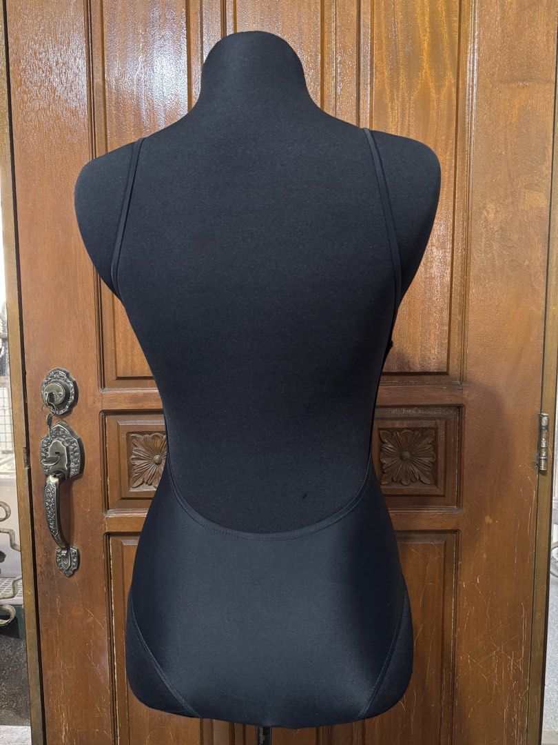 Black One-Piece Swimsuit V-Neck Spaghetti Straps (Category: Bikinis & Swimsuits) located in Manila. Submitted by prelovedshopmnl (Listing ID 1462282944, Image 2). Description: - Classic black one-piece swimsuit - Flattering V-neckline - Delicate spaghetti straps - Low scoop back design - Smooth and stretchy material - Perfect for swimming or lounging.