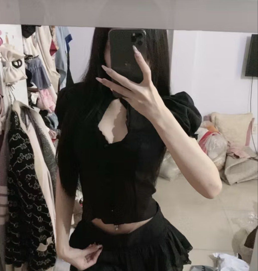 Black Puff Sleeve Cutout Button-Up Top (Category: Blouses) located in Mandaluyong City. Submitted by kiwi29-98299 (Listing ID 1462399614, Image 3). Description: - Too big for me - Black puff sleeve top - High neckline with keyhole cutout - Button-up front with delicate lace trim - Short sleeves with gathered shoulders - Trendy cropped fit, hits at the waist Top Only.