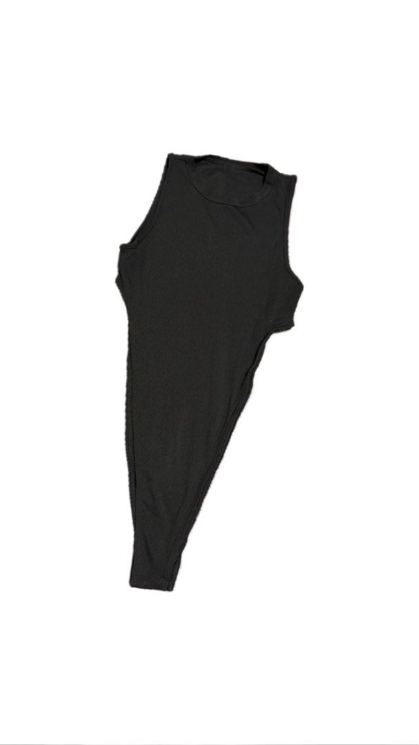 Black Ribbed Sleeveless Bodysuit (Category: Sleeveless) located in Paranaque City. Submitted by nikadeclutters (Listing ID 1462344418, Image 1). Description: Ribbed sleeveless bodysuit with a high neckline. Stretchy and versatile for layering or solo wear..