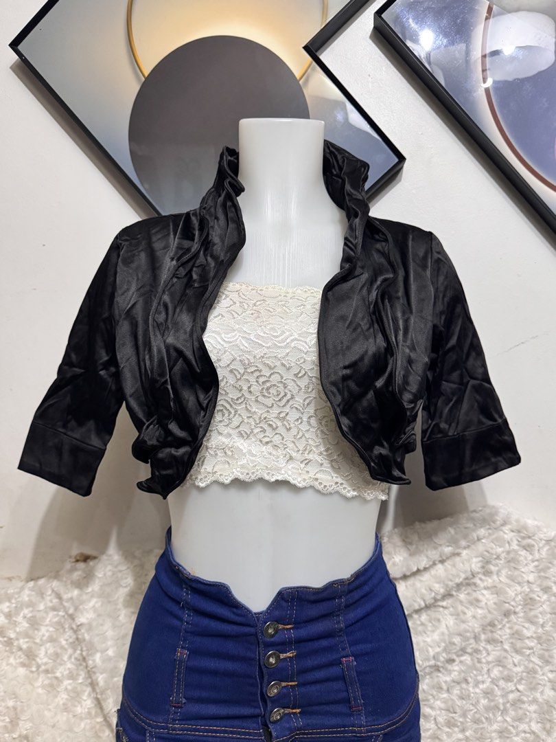 Black Satin Cropped Bolero Jacket with Ruffle Collar (Category: Coats, Jackets and Outerwear) located in Marikina City. Submitted by lorradel (Listing ID 1462341663, Image 1). Description: - fits S-L - Elegant black satin bolero jacket - Cropped length for a modern silhouette - Stylish three-quarter sleeves - Unique ruffled collar detail - Shiny material adds a touch of glamour - Versatile piece: perfect for layering over tube tops or dresses - I