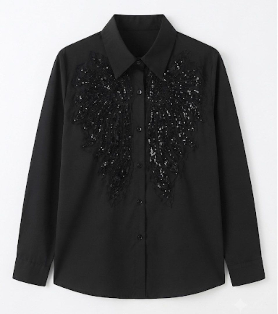 Black Sequined Wing Detail Button-Up Shirt (Category: Shirts) located in Donsol. Submitted by saksthriftavenuebyluckymaria8 (Listing ID 1462369156, Image 3). Description: - Black button-up shirt - Features sequined wing detail on the front - Long sleeves and collared - Perfect for dressing up or down - Looks great with trousers or a skirt - Ideal for evening wear or a statement office look Black long-sleeve button-up shirt featuring striking sequ